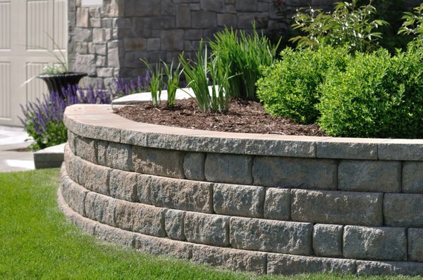 Retaining Walls - Looking for a reliable retaining wall contractor? We specialize in designing and building high-quality retaining walls that enhance the beauty, functionality, and stability of your outdoor space. Whether you need a structural retaining wall to prevent soil erosion or a decorative wall to elevate your landscape, we’ve got you covered!

Our Services Include:
✅ Retaining Wall Design & Installation – Custom-built solutions tailored to your needs
✅ Block, Stone, Concrete & Timber Walls – A variety of materials to match your style
✅ Erosion Control & Drainage Solutions – Ensuring long-lasting durability
✅ Wall Repair & Replacement – Restoring stability and aesthetics
✅ Residential & Commercial Projects – No job is too big or small

With years of experience, high-quality craftsmanship, and a commitment to customer satisfaction, we take pride in delivering strong, long-lasting, and visually appealing retaining walls.

 Contact us today for a free consultation and estimate!