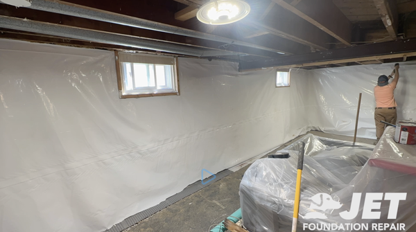 Basement Vapor Barrier and Interior Drain Tile - We completed a project in suburban St. Louis where the basement had been leaking for years. To solve the issue, we installed an interior drain tile system with a sump pump and pit to keep the space dry, added a vapor barrier on the interior foundation wall to block moisture, drilled weep holes in the retaining wall to relieve water pressure, and coordinated plumbing excavation and patching to ensure everything went smoothly.

We include a lifetime, transferable, warranty on our interior drain systems so you can have the peace of mind that your project is done for good.