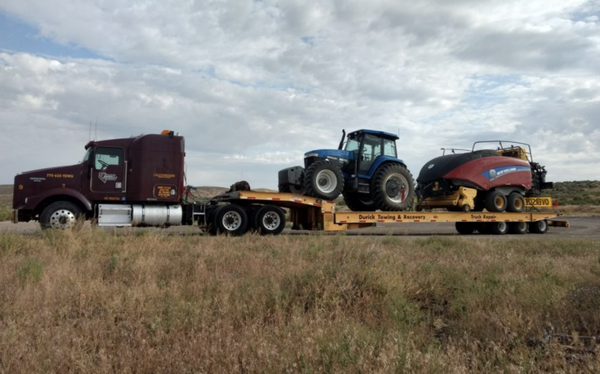 Heavy Transport - Durick Towing & Recovery’s 53-foot, 50-ton Landoll trailer can efficiently accommodate your heavy hauling needs. We transport items that include construction and mining equipment, agricultural vehicles, motor homes, generators and utility trailers.
We take care of your vehicle or equipment with safe, proper securement and dependable pick-up and delivery. Wherever your load needs to be transported, Durick Towing & Recovery delivers. We travel local and long distance. Heavy Transport - Durick Towing & Recovery’s 53-foot, 50-ton Landoll trailer can efficiently accommodate your heavy hauling needs. We transport items that include construction and mining equipment, agricultural vehicles, motor homes, generators and utility trailers.
We take care of your vehicle or equipment with safe, proper securement and dependable pick-up and delivery. Wherever your load needs to be transported, Durick Towing & Recovery delivers. We travel local and long distance.