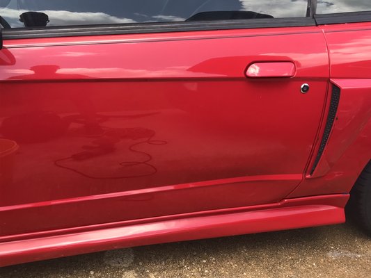 We removed deep scratches from the side of this vehicle by wet sanding and polishing to remove all of the imperfection and refine the finish - We were called out to remove some deep scratches and paint transfer after this customer had been side swiped while parked on the beach. We were able to wet sand all of the imperfections out, and then polish the paint to refine the finish!
