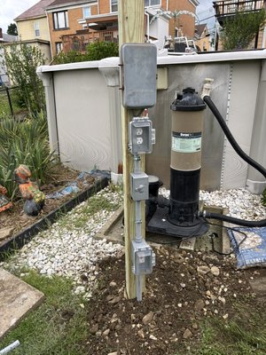 Pool pump upgrade - This customer wanted to upgrade their Electrical System for the outside area and also for the pool pump - We installed a new 4x4 post secured with concrete - And replaced all of the electrical equipment Pool pump upgrade - This customer wanted to upgrade their Electrical System for the outside area and also for the pool pump - We installed a new 4x4 post secured with concrete - And replaced all of the electrical equipment