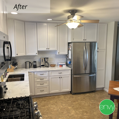 BUFFALO GROVE, IL KITCHEN REMODEL - Buffalo Grove, IL kitchen remodel completed in 2022. These homeowners had green laminate countertops and outdated cabinets they wanted to update. We removed the old cabinets, counters and sink, replacing it all with new white cabinets.