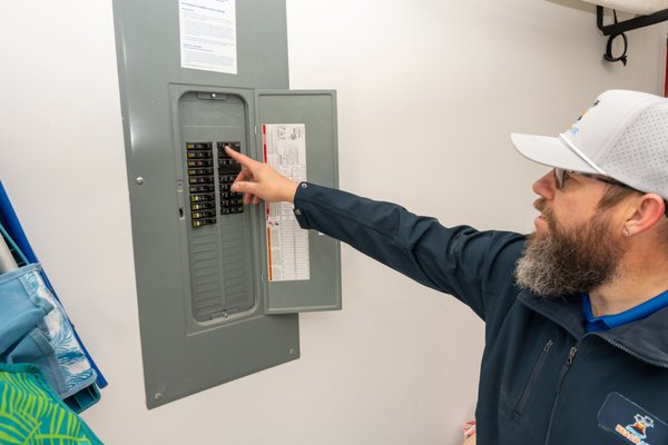 Electrical Project - Homeowner reached out after repeated breaker trips and flickering lights whenever the HVAC system kicked on. Our licensed electricians found an outdated 100-amp panel that couldn't keep up with the home's demand. We replaced it with a new 200-amp panel, corrected several double-tapped breakers, and installed whole-home surge protection to safeguard appliances and electronics from coastal storm surges. The job was completed in one day, passed inspection on the first visit, and the homeowner now has room in the panel for a future EV charger. All work backed by our workmanship guarantee. Electrical Project - Homeowner reached out after repeated breaker trips and flickering lights whenever the HVAC system kicked on. Our licensed electricians found an outdated 100-amp panel that couldn't keep up with the home's demand. We replaced it with a new 200-amp panel, corrected several double-tapped breakers, and installed whole-home surge protection to safeguard appliances and electronics from coastal storm surges. The job was completed in one day, passed inspection on the first visit, and the homeowner now has room in the panel for a future EV charger. All work backed by our workmanship guarantee.