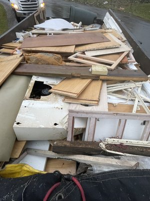 15 Yard Dumpster Rental - Demolition debris from a renovation project from a lovely home in Sharon, MA. 15 Yard Dumpster Rental - Demolition debris from a renovation project from a lovely home in Sharon, MA.