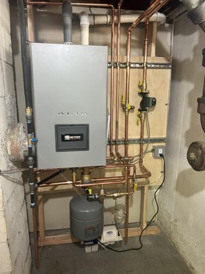 Navien combination boiler install. - A combi-boiler is a home heating system that can be used for both hydronic space heating and domestic hot water production. This dual-function boiler uses dual heat exchangers to heat the hydronic water, and a third heat exchanger to indirectly heat the domestic hot water. Navien combination boiler install. - A combi-boiler is a home heating system that can be used for both hydronic space heating and domestic hot water production. This dual-function boiler uses dual heat exchangers to heat the hydronic water, and a third heat exchanger to indirectly heat the domestic hot water.