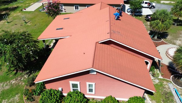Roof re-coating Pelion, SC - ⭐️ Roof Coating Project in Progress! ⭐️

We're excited to share a glimpse of our latest roof coating project! Our team is hard at work applying a high-quality, protective coating to this beautiful reddish roof. This process not only enhances the roof's appearance but also ensures long-lasting durability against the elements.

Our skilled professionals are using top-of-the-line materials to provide superior protection and energy efficiency. We take pride in our attention to detail and commitment to quality.