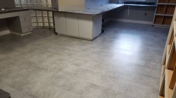 Commercial office luxury vinyl tile flooring installation - This is a renovation of flooring in a clinic of over 2500 sqft with many rooms and areas.
We provided service with the best commercial luxury vinyl tile and a completely nice fresh look to the clinic office
The owner was very satisfied and amazed with the difference the flooring had made to the whole interior