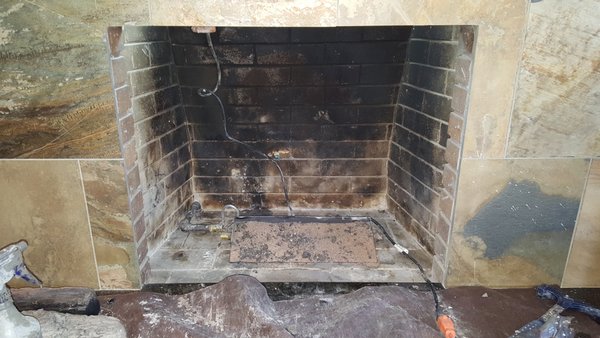 Gas log set refurbish service - Here are some of our gas log refurbishment services we provide for older gas log sets. Service includes Paint firebox black for a uniform appearance, clean gas logs, gas burner, paint gas burner with high temp black paint, New burner sand, new ember glow, reflective floor rock or standard lava floor rock.