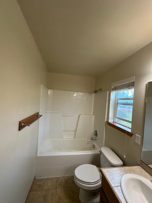 Bathroom drywall repair - We tackled a ceiling repair this week in a guest bath where we needed to get behind the drywall to check for a potential leak. Before making any cuts, we did a full "surgical" prep—wrapping the tub, vanity, and toilet in plastic to keep the dust contained. After cutting an access hole near the exhaust fan to inspect the joists and insulation, we confirmed everything was dry and moved straight into the restoration. We’ve already got the first couple of coats of mud down and feathered out; once we sand, texture, and paint, the ceiling will look like we were never even there. Bathroom drywall repair - We tackled a ceiling repair this week in a guest bath where we needed to get behind the drywall to check for a potential leak. Before making any cuts, we did a full "surgical" prep—wrapping the tub, vanity, and toilet in plastic to keep the dust contained. After cutting an access hole near the exhaust fan to inspect the joists and insulation, we confirmed everything was dry and moved straight into the restoration. We’ve already got the first couple of coats of mud down and feathered out; once we sand, texture, and paint, the ceiling will look like we were never even there.
