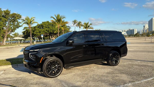 Private Chauffeur Service – Black SUV - Executive airport transfer for business client requiring discretion and punctuality. Vehicle: 2025 Chevrolet Suburban High Country. Flight monitoring, meet & greet, luggage assistance, seamless pickup experience. Professional chauffeur service across South Florida.
