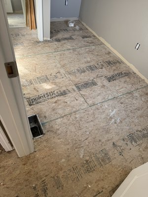 before and after vinly plank installation - Modular home remodel new vinyl plank installed
