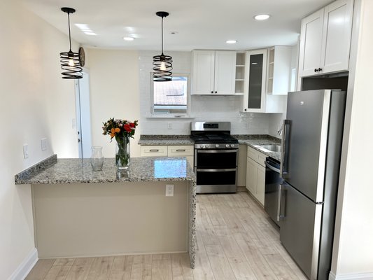 KITHCEN REMODELING - These kitchens have received updates and fully remodeled, showcasing a range of elements such as brand-new cabinets, countertops, flooring, lighting fixtures, appliances, and more.
