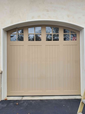 Garage door update - We replaced this old door with a similar, but updated style. Curb appeal upgrade!!