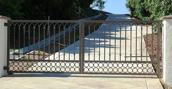 Ornamental Gates - We specialize in creating custom ornamental gates that blend functionality with stunning design. From classic wrought iron to modern sleek styles, our gates are crafted to enhance the beauty, security, and value of your property.

Whether you’re looking for driveway gates, garden gates, or decorative accents, we bring your vision to life with expert craftsmanship and premium materials. Our team is dedicated to providing exceptional service, on-time delivery, and long-lasting quality.

Contact us today to discuss your project and let us create a gate that’s as unique as your space!
