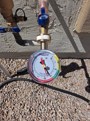 PRV Installation & Pressure Test – Ball Brothers Plumbing and AC - Static water pressure tested at nearly 100 PSI — well above the safe residential range of 40–80 PSI. Ball Brothers Plumbing and AC installed a new pressure reducing valve (PRV) and backflow preventer on the exterior supply line, bringing pressure to safe levels and protecting the home's plumbing fixtures and appliances from damage. PRV Installation & Pressure Test – Ball Brothers Plumbing and AC - Static water pressure tested at nearly 100 PSI — well above the safe residential range of 40–80 PSI. Ball Brothers Plumbing and AC installed a new pressure reducing valve (PRV) and backflow preventer on the exterior supply line, bringing pressure to safe levels and protecting the home's plumbing fixtures and appliances from damage.