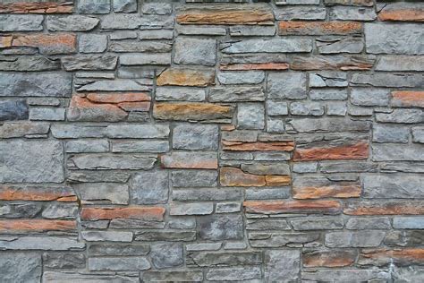 Stone Masonry - Want timeless strength and natural beauty? We build and repair with real stone—walls, steps, fireplaces, columns, and more. No shortcuts. Just old-school craftsmanship, solid footing, and clean finishes built to last through Michigan seasons and then some.