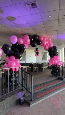 Stella - Bat Mitzwah - We had a chance to decorate Marina City Club Restaurant (Dockside now) for Bat Mitzwah event.
It was a full space transformation:
- Organic Arch at the main entrance
- Helium balloons at the ceiling
- Organic columns with satin ribbon bows
- Foil letters on individual balloon stands.

Pro grade materials: Sempertex, Tuftex balloons.
