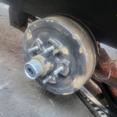 Replacement of damaged drum. - The customer didn't realize that their tire was gone on their trailer. They drove several miles on their rim. This destroyed the rim and drum brakes. We replace the brakes and the rim.