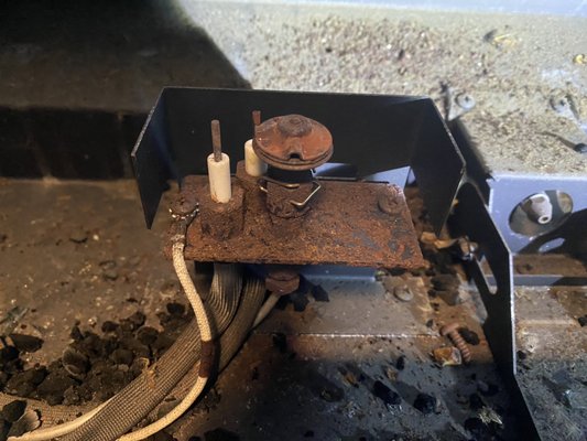 Pilot repair - Rusted out electronic pilot. The Department of Energy is trying to mandate all newer direct vent fireplaces have electronic ignition which sounds great on paper, but in reality is a total disaster. A continuous pilot may burn about $2 in gas every month and warm your room a very small amount in the summer months, but it balances the humidity inside your fireplace. While direct vent fireplaces are sealed they are not air tight. There is a constant fight of humidity from outside vs inside causing moisture inside the firebox. This in turn rusts the inside of your fireplace greatly reducing its useful life and leads to a lot more maintenance issues. This is a prime example. This fireplace is less than 10 years old and flames were shooting out the bottom. My prediction after nearly 25 years of experience is there will be a lot more explosions due to people not maintaining their fireplaces properly. Expect pilot replacements every 5-10 years with these newer units and sadly these are not cheap fixes. Newer units are more compact and very difficult to work on even for experienced techs. This will lead to longer service visits and an increase in service fees in the very near future. We keep up on the technology by taking classes and taking on repairs others won’t or can’t do. Please, for the love of god, do not attempt repairs if you aren’t experienced in this field! We can’t stress this enough. The last customer that tried to diagnose a problem himself ended up with over $2,000 in repairs and nearly burned the house down. Pilot repair - Rusted out electronic pilot. The Department of Energy is trying to mandate all newer direct vent fireplaces have electronic ignition which sounds great on paper, but in reality is a total disaster. A continuous pilot may burn about $2 in gas every month and warm your room a very small amount in the summer months, but it balances the humidity inside your fireplace. While direct vent fireplaces are sealed they are not air tight. There is a constant fight of humidity from outside vs inside causing moisture inside the firebox. This in turn rusts the inside of your fireplace greatly reducing its useful life and leads to a lot more maintenance issues. This is a prime example. This fireplace is less than 10 years old and flames were shooting out the bottom. My prediction after nearly 25 years of experience is there will be a lot more explosions due to people not maintaining their fireplaces properly. Expect pilot replacements every 5-10 years with these newer units and sadly these are not cheap fixes. Newer units are more compact and very difficult to work on even for experienced techs. This will lead to longer service visits and an increase in service fees in the very near future. We keep up on the technology by taking classes and taking on repairs others won’t or can’t do. Please, for the love of god, do not attempt repairs if you aren’t experienced in this field! We can’t stress this enough. The last customer that tried to diagnose a problem himself ended up with over $2,000 in repairs and nearly burned the house down.