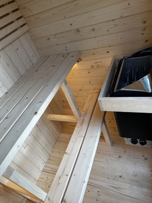 Outdoor Infrared Sauna Assembly & Installation - The customer purchased a prefabricated outdoor infrared sauna kit and needed professional assembly and installation. The project included careful assembly of the cedar structure, roof, tempered glass door, benches, and all manufacturer-supplied hardware.
Throughout the installation, each section was carefully aligned to ensure proper fit, smooth door operation, and a weather-resistant structure. The curved roof required precise positioning of multiple components before the waterproof roofing underlayment and asphalt shingles were installed.
The customer also requested several custom upgrades beyond the standard kit assembly. I installed custom interior lighting and assembled the infrared heating system, including the control panel, temperature sensor, and all manufacturer-supplied internal components and wiring according to the manufacturer's specifications.
The interior benches, backrests, and trim were carefully installed and aligned for both comfort and appearance. After the structural assembly was complete, the roof was waterproofed and finished with asphalt shingles to provide long-term weather protection.
The completed sauna is fully assembled, weather-protected, and ready for years of reliable use. Outdoor Infrared Sauna Assembly & Installation - The customer purchased a prefabricated outdoor infrared sauna kit and needed professional assembly and installation. The project included careful assembly of the cedar structure, roof, tempered glass door, benches, and all manufacturer-supplied hardware.
Throughout the installation, each section was carefully aligned to ensure proper fit, smooth door operation, and a weather-resistant structure. The curved roof required precise positioning of multiple components before the waterproof roofing underlayment and asphalt shingles were installed.
The customer also requested several custom upgrades beyond the standard kit assembly. I installed custom interior lighting and assembled the infrared heating system, including the control panel, temperature sensor, and all manufacturer-supplied internal components and wiring according to the manufacturer's specifications.
The interior benches, backrests, and trim were carefully installed and aligned for both comfort and appearance. After the structural assembly was complete, the roof was waterproofed and finished with asphalt shingles to provide long-term weather protection.
The completed sauna is fully assembled, weather-protected, and ready for years of reliable use.