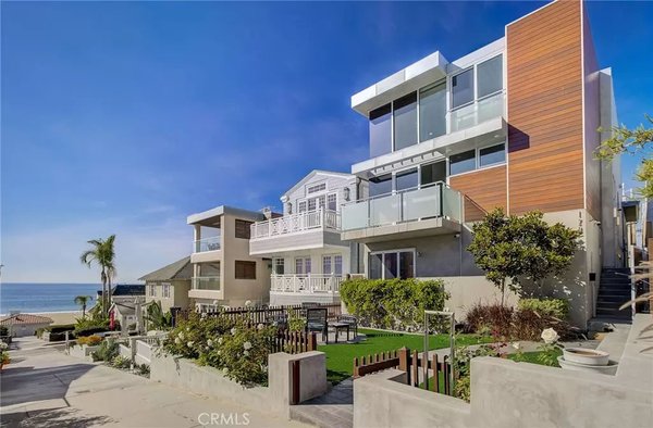 129 8th Street Manhattan Beach, CA 90266 - The ultimate Manhattan Beach dream home couldn’t possibly exist, since it would require 1) a walk street location no more than four houses from the sand, 2) to be South Facing 3) well over 3,000 SF of contemporary living space, 4) stunning ocean views from every level, 5) separate guest quarters with a private entrance and 6) parking for – let’s say – six vehicles. Oh, and it should be no more than a 30-second stroll from downtown. Fortunately, today is your lucky day. Unicorns may not be real, but the ultimate MB dream home has an actual address: 129 8th Street. This sleek, 3-story luxury home impresses before even entering thanks to its walk street-facing front yard with synthetic lawn & lounging patio, but it’s what’s inside that will take your breath away. The home’s dramatically open, light-filled main level with double-height ceilings combines an ocean-view living room with fireplace, adjacent dining area and a fully equipped chef’s kitchen with 6-burning Viking Professional range, charming pass-thru-style bar counter and nook. Upstairs, an art gallery-inspired loft area with jaw-dropping transparent glass flooring boasts impressive sight lines to the great room below and crashing ocean waves beyond. All three of the main home’s bedrooms are located downstairs, in addition to an office/gym space. The resort-like owner’s suite – strategically located on a corner to maximize ocean vistas – includes a patio leading to the front yard, a spa-like bathroom with rain shower & double sinks, and two closets with custom built-ins. A secluded patio area off the home’s main level leads to a 2-bedroom guest house with full bathroom, kitchenette, and private entrance. Parking for 4 cars and a golf cart (2-car garage, 2-car driveway, and 1 golf cart space) and an ideal location just steps from the energy of downtown Manhattan Beach makes 129 8th Street truly unique… and almost as rare as a unicorn. Make your move before this once-in-a-lifetime dream home *stays* in your dreams. 129 8th Street Manhattan Beach, CA 90266 - The ultimate Manhattan Beach dream home couldn’t possibly exist, since it would require 1) a walk street location no more than four houses from the sand, 2) to be South Facing 3) well over 3,000 SF of contemporary living space, 4) stunning ocean views from every level, 5) separate guest quarters with a private entrance and 6) parking for – let’s say – six vehicles. Oh, and it should be no more than a 30-second stroll from downtown. Fortunately, today is your lucky day. Unicorns may not be real, but the ultimate MB dream home has an actual address: 129 8th Street. This sleek, 3-story luxury home impresses before even entering thanks to its walk street-facing front yard with synthetic lawn & lounging patio, but it’s what’s inside that will take your breath away. The home’s dramatically open, light-filled main level with double-height ceilings combines an ocean-view living room with fireplace, adjacent dining area and a fully equipped chef’s kitchen with 6-burning Viking Professional range, charming pass-thru-style bar counter and nook. Upstairs, an art gallery-inspired loft area with jaw-dropping transparent glass flooring boasts impressive sight lines to the great room below and crashing ocean waves beyond. All three of the main home’s bedrooms are located downstairs, in addition to an office/gym space. The resort-like owner’s suite – strategically located on a corner to maximize ocean vistas – includes a patio leading to the front yard, a spa-like bathroom with rain shower & double sinks, and two closets with custom built-ins. A secluded patio area off the home’s main level leads to a 2-bedroom guest house with full bathroom, kitchenette, and private entrance. Parking for 4 cars and a golf cart (2-car garage, 2-car driveway, and 1 golf cart space) and an ideal location just steps from the energy of downtown Manhattan Beach makes 129 8th Street truly unique… and almost as rare as a unicorn. Make your move before this once-in-a-lifetime dream home *stays* in your dreams.