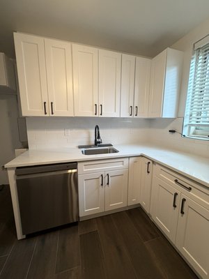 Full Kitchen renovation - We renovated this outdated kitchen into a clean, modern, and functional space. The project included full demolition, new cabinets, countertops, sink, fixtures, backsplash, and stainless steel appliances. Our goal was to create a kitchen that matched the rest of the home while improving both appearance and everyday usability. The finished result gave the homeowner a brighter space with better flow, more storage, and a fresh updated look.