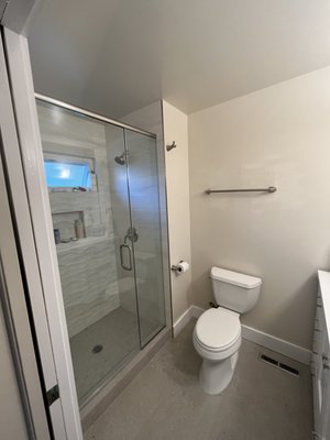Bathroom Water Damage Restoration - The bathroom suffered serious water damage from a failed toilet flange and faulty window in the shower stall. The walls and floor were opened to the studs and joists to find serious dry and wet rot as well as active termites.
We removed and repaired all the the damaged framing, updated the plumbing, and upgraded the tile and vanity.
We advocated for the client to make sure the insurance claim covered as much as possible which offset the over all costs significantly.