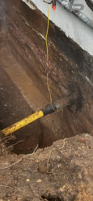 Foundation Repair & Waterproofing - Foundation repair entailed Excavation, Cleaning of foundation walls to expose all holes & cracks, apply mortar mix, thick rubberized protective coating, with footing drain & outdoor sump pump.