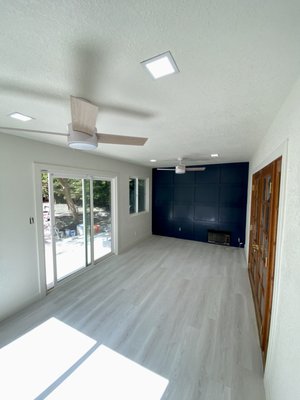 Office Remodel - This renovation was done in an old office that was in a bad condition. We removed the old material from the walls. Windows were replaced, instead of one window we made a decorative wall. Completely new electrics were carried out so that the room was bright and comfortable with two fans. Installed drywall, textured and painted. The floors were covered with light laminate. The new office is bright and comfortable.