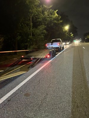 HAULER HELP - Helping out a hauler with a broke down car stuck on it. Winch out performed. HAULER HELP - Helping out a hauler with a broke down car stuck on it. Winch out performed.
