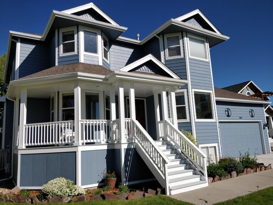 Transforming Two Story Home - Facing a large lake in Loveland, Colorado, we repainted this beautiful home and updated all the woodwork. It took 5-6 days from pressure washing through finishing touches to transform this home into a highlight of the neighborhood. Many of the peak areas required very tall ladders to ensure paint coverage and fine attention to detail. All the stained wood needed to be primed and sealed before painting to ensure no future issues. The owners were very kind and easy to work with through this project! They love their new home! Transforming Two Story Home - Facing a large lake in Loveland, Colorado, we repainted this beautiful home and updated all the woodwork. It took 5-6 days from pressure washing through finishing touches to transform this home into a highlight of the neighborhood. Many of the peak areas required very tall ladders to ensure paint coverage and fine attention to detail. All the stained wood needed to be primed and sealed before painting to ensure no future issues. The owners were very kind and easy to work with through this project! They love their new home!