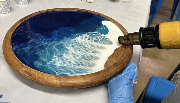 Resin Pour Workshops - Discover the vibrant world of resin art in our engaging Resin Pour Workshops! Perfect for artists of all levels, these hands-on sessions allow you to unleash your creativity while working with non-toxic materials. Dive into the mesmerizing process of mixing and pouring resin to create stunning, one-of-a-kind art pieces. Our friendly instructors will guide you through each step, ensuring a fun and inspiring experience for everyone. Gather your friends or make new ones as you explore color, texture, and design in a relaxed environment. Join us for a memorable day of artistic expression!