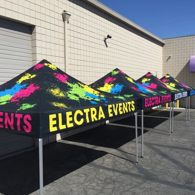 Custom Tents Pop-up Canopies 10' x 10' - Custom 10' x 10' Pop-Up Tent with a full color digital print top and heavy duty aluminum frame. Backdrop wall and side banners with hardware are a great addition to your tent set-up.
The Custom Canopy is printed and sewn on Weather Resistant Tent Polyester. You can print your brand message on each of the four peaks of the canopy as well as on the valance panels. Custom Tents Pop-up Canopies 10' x 10' - Custom 10' x 10' Pop-Up Tent with a full color digital print top and heavy duty aluminum frame. Backdrop wall and side banners with hardware are a great addition to your tent set-up.
The Custom Canopy is printed and sewn on Weather Resistant Tent Polyester. You can print your brand message on each of the four peaks of the canopy as well as on the valance panels.