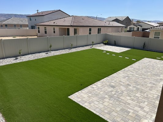 West Ave J-11 - This backyard was nothing but dirt in the beginning. We helped the homeowner come up with a design that included artificial turf, pavers, rock and plants. It’s almost unbelievable that the before and after pictures are of the same yard! Homeowner was thrilled with his new yard! West Ave J-11 - This backyard was nothing but dirt in the beginning. We helped the homeowner come up with a design that included artificial turf, pavers, rock and plants. It’s almost unbelievable that the before and after pictures are of the same yard! Homeowner was thrilled with his new yard!