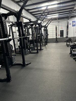 Weight Room - The Ryan Davis Signature Racks:
At the heart of our collegiate weight room are the three coveted Ryan Davis Signature Racks, a symbol of our unwavering commitment to excellence in sports performance training. These racks are a rarity, with only one other facility worldwide privileged to offer them. When you enter our weight room, you're not just accessing equipment; you're gaining access to a realm of possibilities that have been optimized for peak athletic performance.
