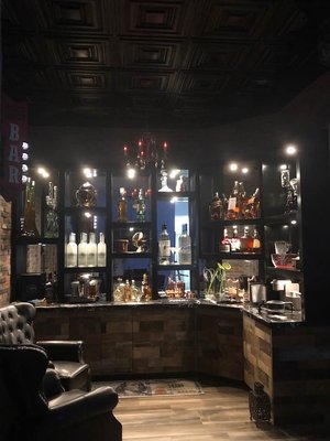Custom Bar Design - Custom Bar with reclaimed wood style cabinets. Custom shelving with built-in lighting Custom Bar Design - Custom Bar with reclaimed wood style cabinets. Custom shelving with built-in lighting