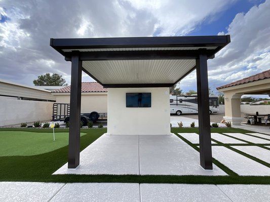 Beautiful 12x12 freestanding patio cover with added TV wall - Beautiful 12x12 two toned freestanding patio cover with added TV wall. This added seating area with shade and entertainment to enhance this backyards living space! Message on Yelp or call us today to discuss your patio cover options to fit your backyard space.