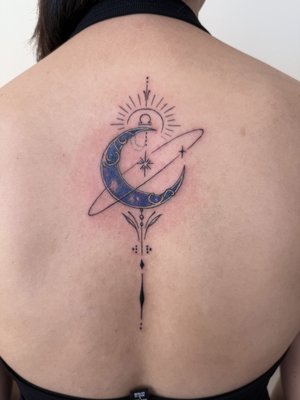 Sailor Moon-inspired tattoo - A delicate and enchanting tattoo inspired by Sailor Moon, featuring iconic symbols, celestial motifs, and subtle magical details. Designed in a fine-line, minimalist style, this piece captures the essence of the beloved anime while adding a personal, artistic touch. Perfect for fans who want a whimsical yet sophisticated tribute to the series.