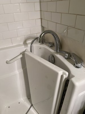 Walk-in Tub - This tub was tough to get out and even harder to put in place. The customer made a mistake measuring and ordered a tub to large so I had to remove a part of the wall for it to fit. This customer also did not have waterproofing membrane down which I applied. Walk-in Tub - This tub was tough to get out and even harder to put in place. The customer made a mistake measuring and ordered a tub to large so I had to remove a part of the wall for it to fit. This customer also did not have waterproofing membrane down which I applied.
