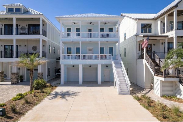 7349 Grand Navarre Bldv Boulevard, Navarre, FL 32566 - Discover coastal living just moments from the pristine shoreline of Navarre Beach and the breathtaking beauty of Gulf Islands National Seashore. Experience the best of Florida's Emerald Coast in this beautifully designed, newly constructed 6-bedroom, 5-bathroom beach home, thoughtfully crafted for comfort, durability, and effortless coastal living. Whether you're seeking a full-time residence, a vacation getaway or a high-performing short-term rental investment, this exceptional property checks every box. Built on a Helical Piles/Piers foundation, this home offers enhanced structural stability and long-term durability. Inside, you'll find a bright, open-concept layout filled with natural light and coastal-inspired finishes throughout. The living and dining areas flow into a modern kitchen, creating the perfect space for entertaining large groups. Two primary suites provide flexibility for multi-generational living or hosting guests in comfort and privacy. Designed with both relaxation and recreation in mind, the home features: A private elevator for easy access to all levels, a dedicated game room for endless entertainment, a swim spa ideal for year-round enjoyment Offered fully furnished with the golf cart and swim spa, this turnkey property allows you to start enjoying--or renting--immediately. With no HOA restrictions, you'll have greater freedom and flexibility for personal use or short-term rental opportunities. Located near sugar-white sands, emerald waters, and the protected natural beauty of the national seashore, this stunning Navarre Beach home is where modern luxury meets laid-back coastal charm. Your beach lifestyle begins here. 7349 Grand Navarre Bldv Boulevard, Navarre, FL 32566 - Discover coastal living just moments from the pristine shoreline of Navarre Beach and the breathtaking beauty of Gulf Islands National Seashore. Experience the best of Florida's Emerald Coast in this beautifully designed, newly constructed 6-bedroom, 5-bathroom beach home, thoughtfully crafted for comfort, durability, and effortless coastal living. Whether you're seeking a full-time residence, a vacation getaway or a high-performing short-term rental investment, this exceptional property checks every box. Built on a Helical Piles/Piers foundation, this home offers enhanced structural stability and long-term durability. Inside, you'll find a bright, open-concept layout filled with natural light and coastal-inspired finishes throughout. The living and dining areas flow into a modern kitchen, creating the perfect space for entertaining large groups. Two primary suites provide flexibility for multi-generational living or hosting guests in comfort and privacy. Designed with both relaxation and recreation in mind, the home features: A private elevator for easy access to all levels, a dedicated game room for endless entertainment, a swim spa ideal for year-round enjoyment Offered fully furnished with the golf cart and swim spa, this turnkey property allows you to start enjoying--or renting--immediately. With no HOA restrictions, you'll have greater freedom and flexibility for personal use or short-term rental opportunities. Located near sugar-white sands, emerald waters, and the protected natural beauty of the national seashore, this stunning Navarre Beach home is where modern luxury meets laid-back coastal charm. Your beach lifestyle begins here.