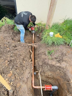 2” Water Line Repair underground. - The existing 2” water lines for the building was leaking. It was underneath the tree. The roots of the tree applied pressure to the water line and broke it. Instead of digging up all the tree and demo-ing it. We found the water line in front of the tree,  and did a water line re-route around the tree. The new line is now in safer place from the tree.  We ensures the new line has proper burial depth and we used high quality material.  The job came out great and no further leaks were found.