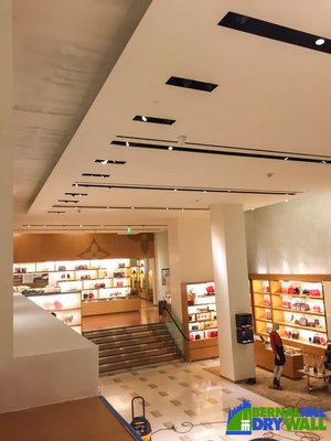 Louis Vuitton - Union Square, San Francisco - This project consisted of framing over the existing pocket ceiling. This is where the Louis Vuitton glass art piece once hung from; we started by metal framing the ceiling pocket then installing sheetrock, and finally taping (drywall finishing). Louis Vuitton - Union Square, San Francisco - This project consisted of framing over the existing pocket ceiling. This is where the Louis Vuitton glass art piece once hung from; we started by metal framing the ceiling pocket then installing sheetrock, and finally taping (drywall finishing).