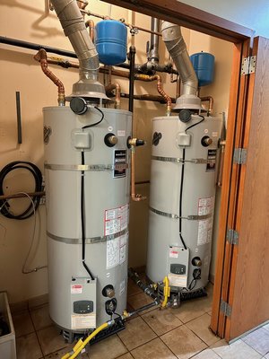 Commercial Water Heater - This water heater replacement was completed at a local Gym. One water heater went out and the other started to leak the next day. Luckily parts were available within the next business day for delivery. Corey and Anthony installed these two 100 gallon 800 pound water heaters the same day of delivery!