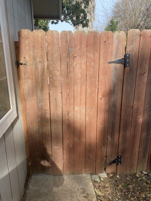 Gate Service! - When I arrived this gate was binding, broken at the hinge, and loose from old age and distressed hardware :/ Tenant informs me that the gate has been unusable since they moved in…Time to get to work! After bending back the bottom hinge, the next step was to straighten both hinges. What a big difference! Now that the gate can swing properly it was time to adjust the gate frame, and add a new pull cable to the latch. Repair Complete!