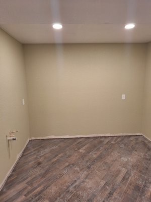 Basement Finish 2024 - This basement finish happened for a great family in the Aurora area. The finished area was over 1600 square feet. Including a kitchenette, full bathroom, 2 bedrooms  new furnace and a/c, water heater, and a panel upgrade. A satisfied customer that continues to have e us in her home for more projects. It started in her master bath with a heated jet tub. We are ending with a heated driveway