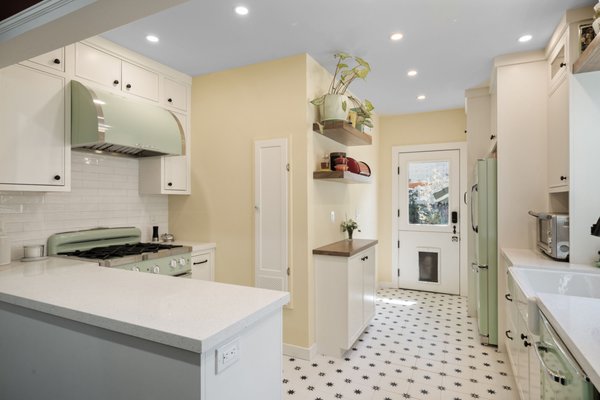 Kitchen Remodel - We had the opportunity to refresh and redesign the layout of this historic home, focusing on improving the flow throughout each space while honoring its original character. By opening up key areas and thoughtfully reworking the floor plan, we created a layout that feels more natural and inviting for modern living. At the same time, we carefully preserved and highlighted the home’s historic charm, blending in modern finishes and design elements that complement, rather than overshadow, its timeless details. The result is a home that feels both fresh and functional, with a perfect balance of history and modern style.