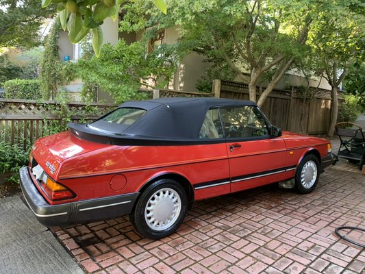 Full Package: Classic Saab 900 Convertible - A classic Saab 900 convertible with tan leather, kept in a driveway under trees. The owner booked our Full Package. Interior we did a full vacuum, leather cleaned and conditioned, carpets shampooed and extracted, dash and console detailed, glass polished. Exterior we did a hand wash, clay bar, hand wax, soft top cleaned, wheels and tires dressed. We came to the customer's home and worked in the driveway. All photos are after the detail has been performed. Full Package: Classic Saab 900 Convertible - A classic Saab 900 convertible with tan leather, kept in a driveway under trees. The owner booked our Full Package. Interior we did a full vacuum, leather cleaned and conditioned, carpets shampooed and extracted, dash and console detailed, glass polished. Exterior we did a hand wash, clay bar, hand wax, soft top cleaned, wheels and tires dressed. We came to the customer's home and worked in the driveway. All photos are after the detail has been performed.