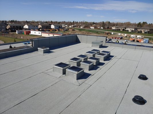 RCMP building - Commercial roof torch on system new construction, Sikalastic Roof Pro over the top system. RCMP building - Commercial roof torch on system new construction, Sikalastic Roof Pro over the top system.