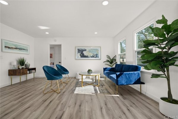 Family Room Staging - It doesn't matter the shape or size of your family room, we can stage it and make it look modern, yet comfortable.