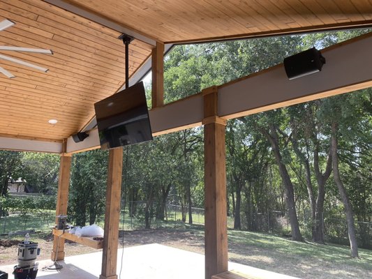 Patio Entertainment Area - The customer wanted to add a patio entertainment area to their backyard. The Tv is mounted to the ceiling and the speakers are powered by a Sonos Amp that is installed in a closet inside the home. We had to upgrade the Wifi to allow for control of the equipment. There is also a subwoofer behind the seating area. The home owner said we exceeded their expectations! Patio Entertainment Area - The customer wanted to add a patio entertainment area to their backyard. The Tv is mounted to the ceiling and the speakers are powered by a Sonos Amp that is installed in a closet inside the home. We had to upgrade the Wifi to allow for control of the equipment. There is also a subwoofer behind the seating area. The home owner said we exceeded their expectations!
